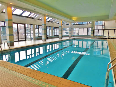 Indoor pool in Les Cours du Mont Royal Residential Building