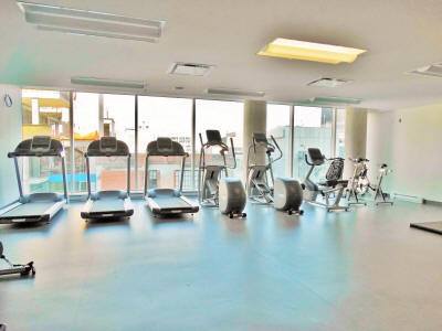 Gym at Altitude Condo building in the International Quarter